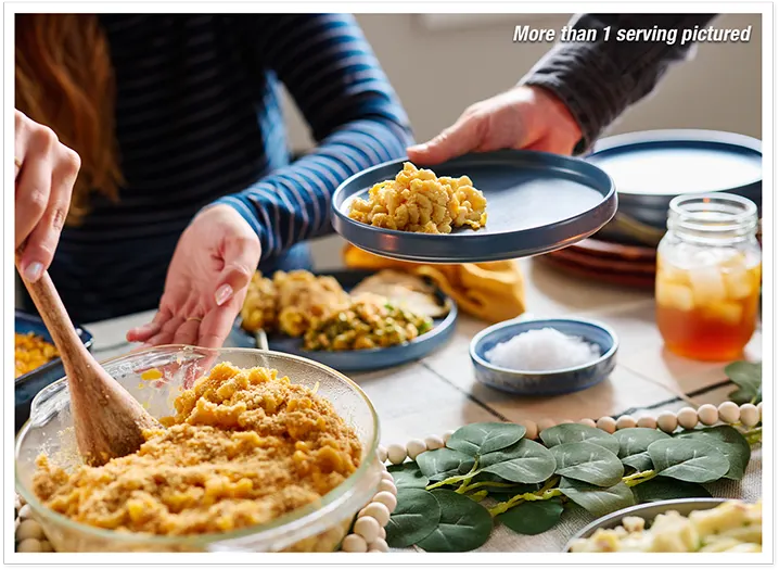 Family enjoying 4Patriots survival food at the table