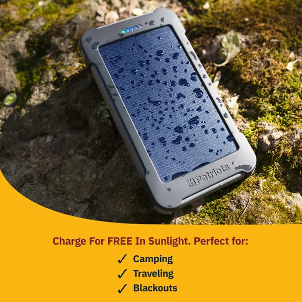 Patriot Power Cell CX recharging for free using its built-in solar panel outdoors — weather-resistant design