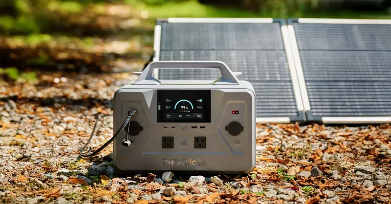 Patriot Power Generator 1200 with the included folding 100W solar panel outdoors